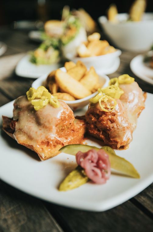 Fried chicken with guacamole and fries
